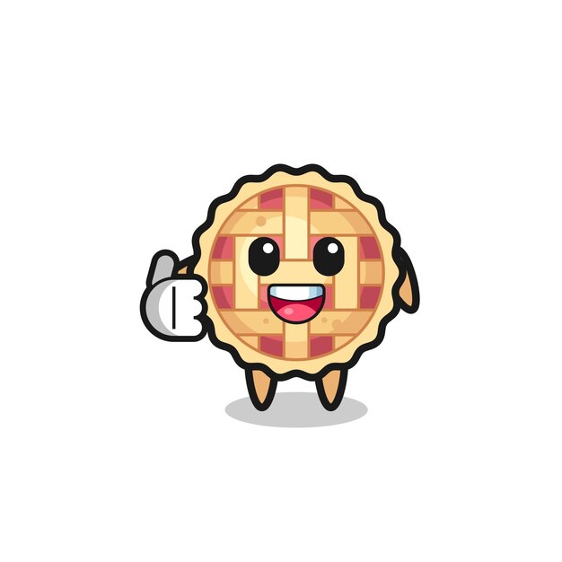 mascota de tarta de manzana haciendo gesto de aprobación