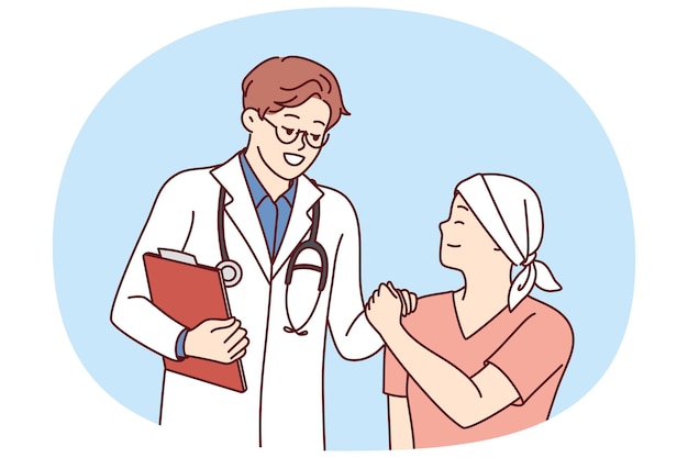 El médico le da la mano a un pequeño paciente con cáncer que se somete a quimioterapia para combatir el cáncer