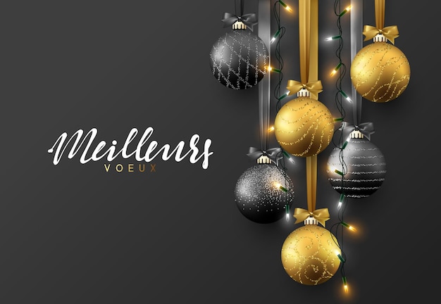 Meillieurs voeux Joyeux Noel. Tarjeta de felicitación de Navidad, diseño de bola de Navidad negra y dorada con guirnaldas realistas sobre fondo oscuro.