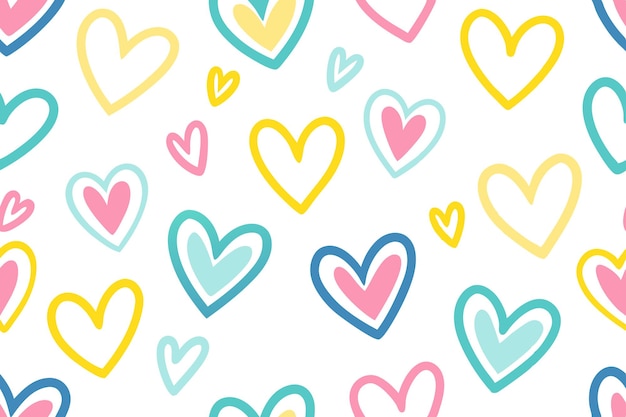 Modelo de corazón colorido con corazones azules amarillos rosados sobre un fondo blanco