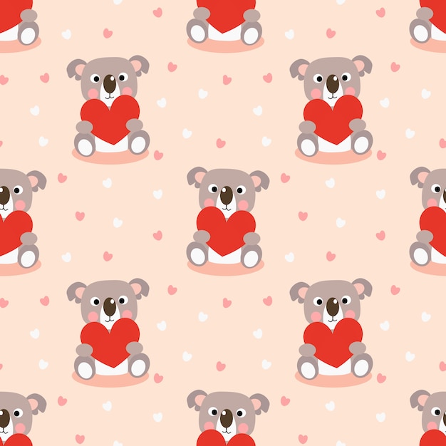 Modelo inconsútil del koala lindo y del corazón rojo.