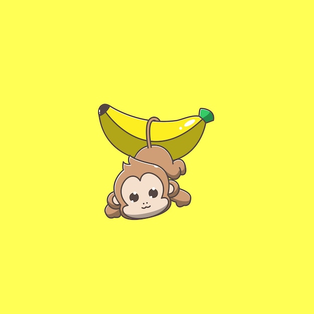 Mono colgando de un plátano
