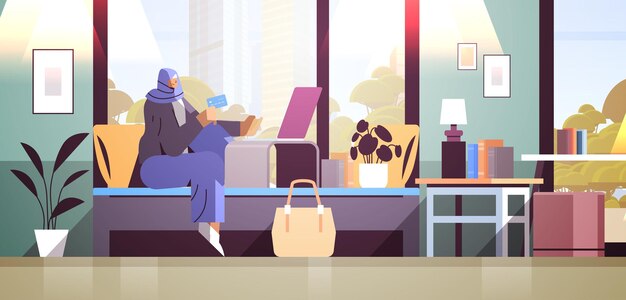 Mujer árabe con tarjeta de crédito usando laptop concepto de compras en línea sala de estar interior horizontal ilustración vectorial de longitud completa