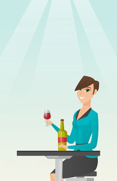 Mujer bebiendo vino en el restaurante.