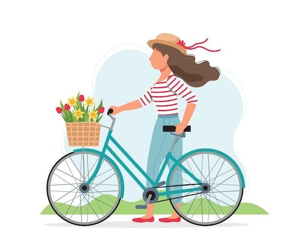 Mujer con una bicicleta con flores en la cesta en primavera.