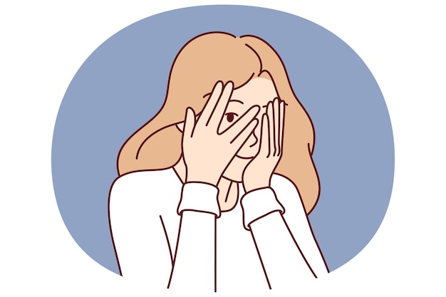 La mujer se cubre los ojos con las manos y se niega a ver cosas desagradables y se esconde de los problemas