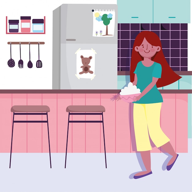 Mujer con cuenco en manos en la cocina