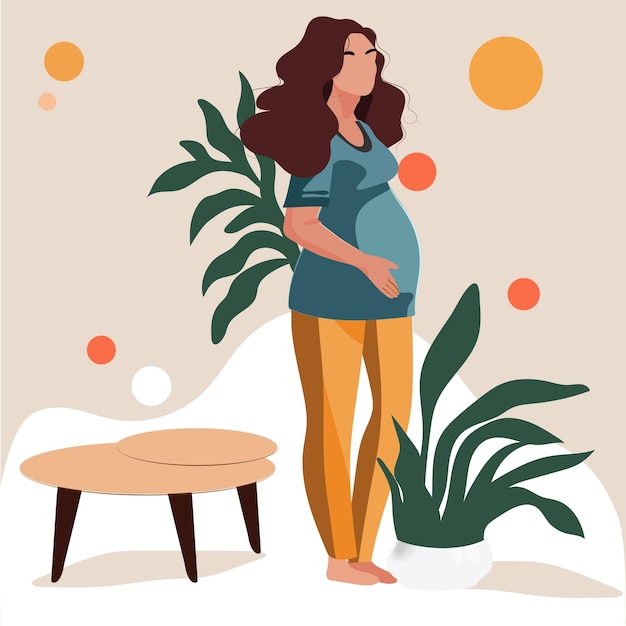 Una mujer embarazada parada frente a una mesa con una planta encima