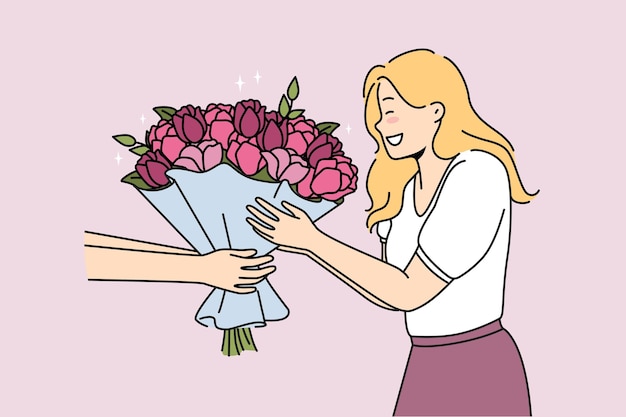 Mujer emocionada recibe flores para cumpleaños