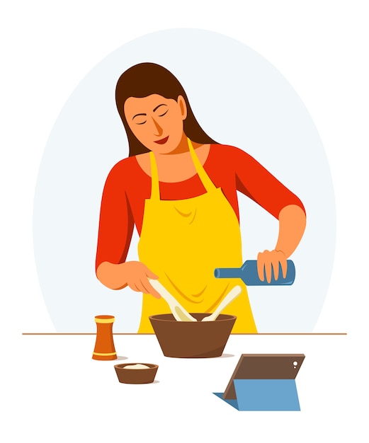 La mujer está aprendiendo a cocinar en línea sola en casa.
