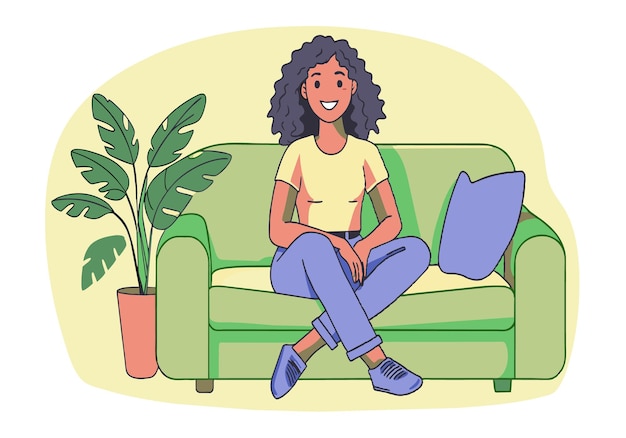 Una mujer está sentada en un sofá con una planta en el fondo