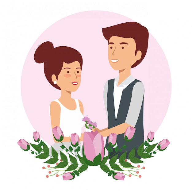 Mujer y hombre novios con flores