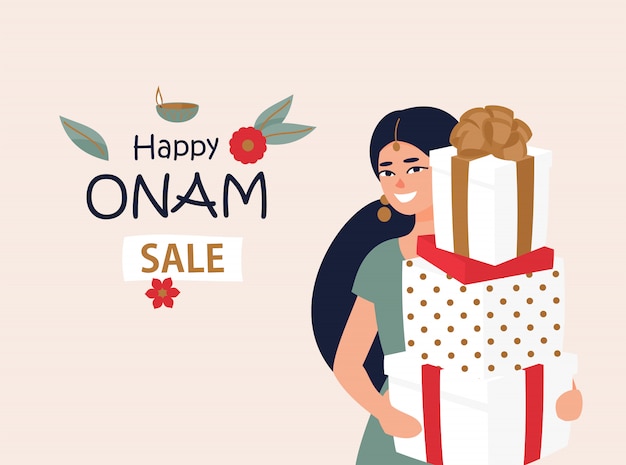 Mujer india con cajas de regalo para el festival de onam
