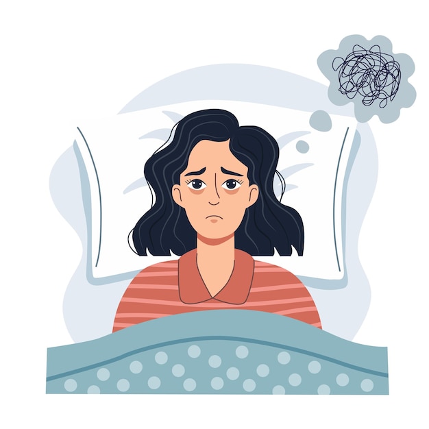 Mujer con insomnio acostada en la cama llena de estrés pensamientos confundidos cuando no puede dormir