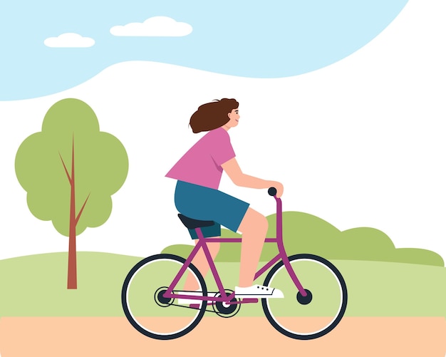 Mujer joven en bicicleta en el parque Sonriente niña feliz paseos en bicicleta Actividad al aire libre