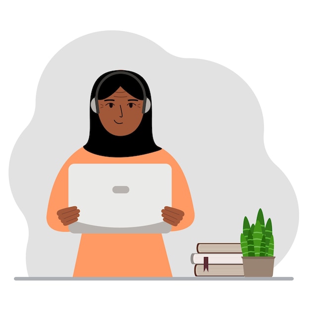 Mujer musulmana con computadora portátil y auriculares Trabajando desde casa estudiante independiente asistente blogger o empresario Concepto de oficina en casa