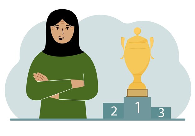 Una mujer musulmana junto al pedestal en el que se encuentra la copa de la victoria y el primer lugar