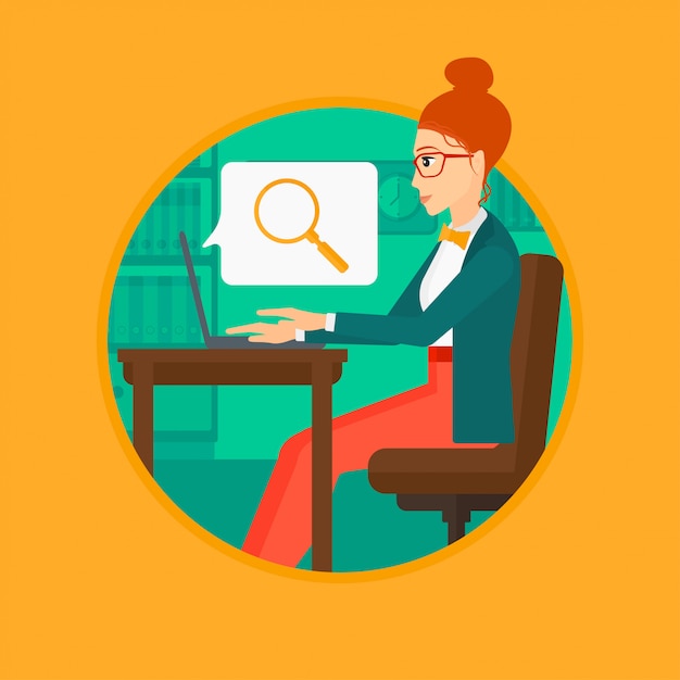 Mujer de negocios que trabaja en su computadora portátil.