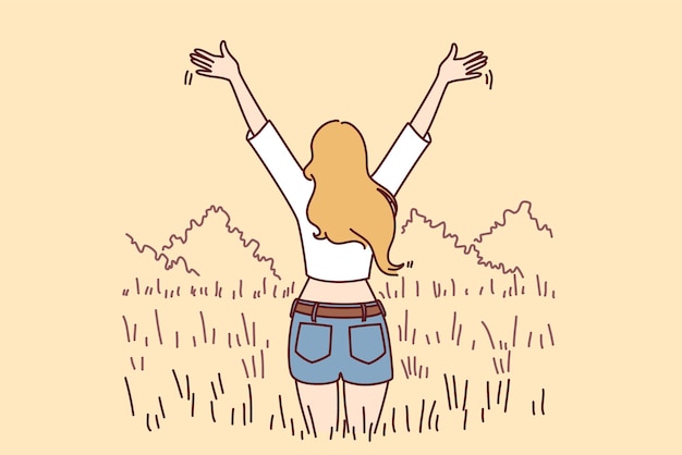 Mujer parada en el campo emocionada con un buen día