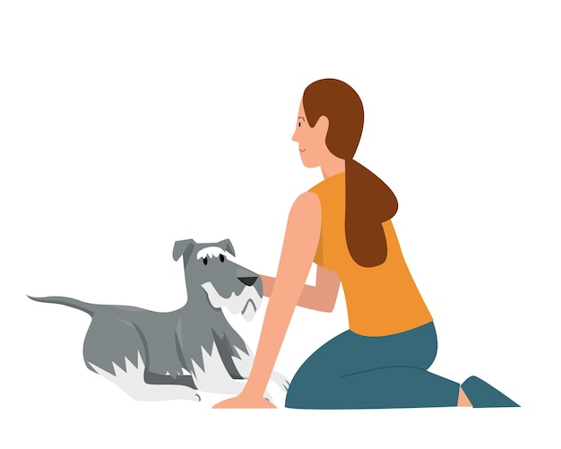 Mujer y perro feliz sentado en el suelo mujer joven jugando y abrazando a su amigo mascota