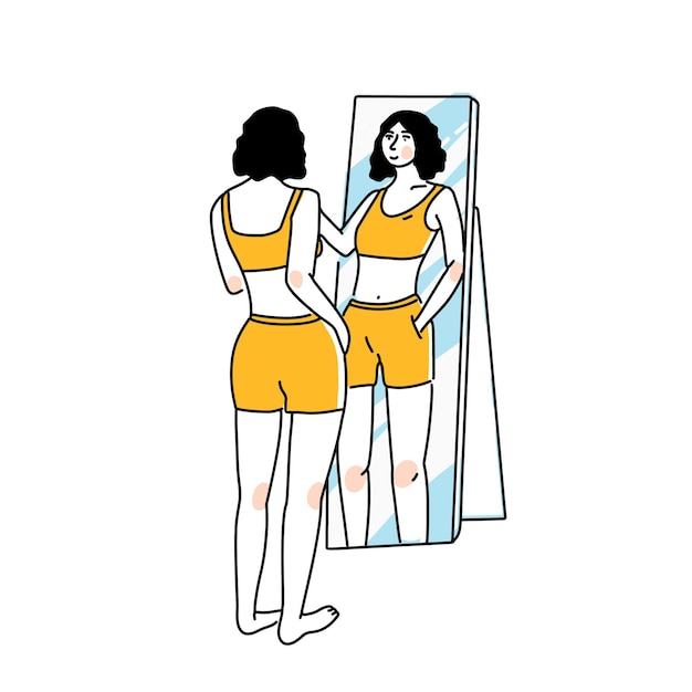 Mujer de pie y mirando el reflejo del espejo. Concepto de autoconfianza y amor propio. Mujer alta y delgada en ropa interior amarilla aislada sobre fondo blanco.