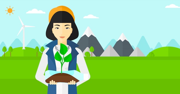 Mujer con planta que crece en botella