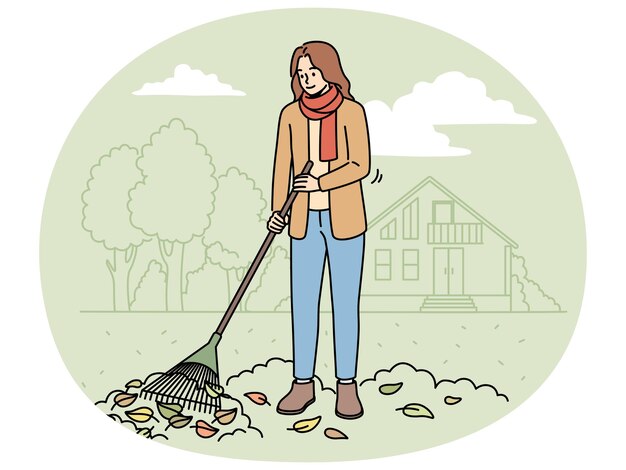 Mujer con rastrillo barriendo hojas en otoño