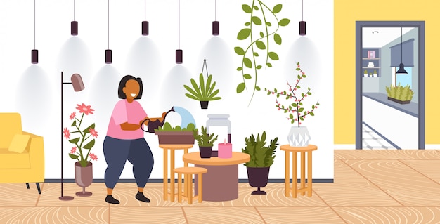 Vector mujer con regadera cuidando plantas de interior niña cuidando plantas de interior quedarse en casa estilo de vida