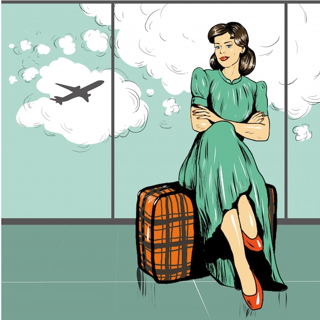 Mujer sentada en una bolsa en el aeropuerto esperando un vuelo