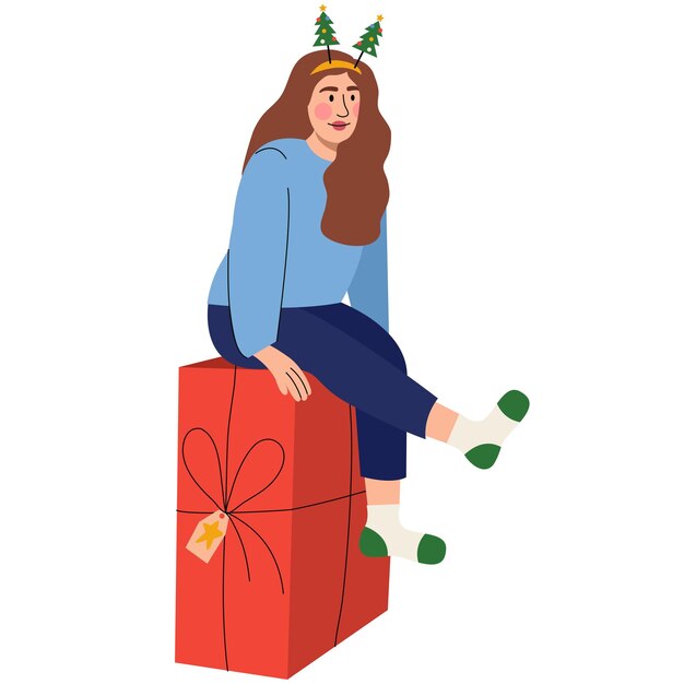 Mujer sentada en un regalo de Navidad Celebración de Año Nuevo o Navidad