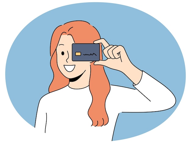 Mujer sonriente con tarjeta de crédito en las manos