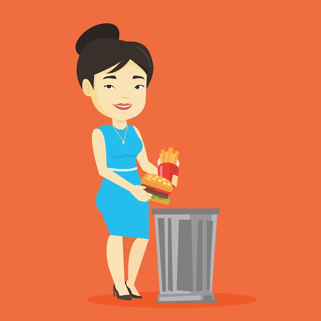 Mujer tirando comida chatarra.