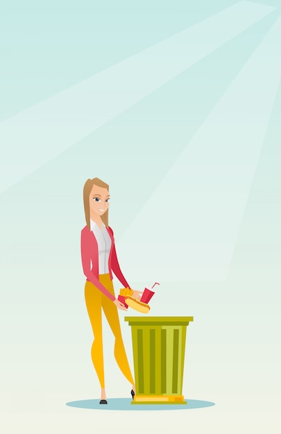 Mujer tirando comida chatarra
