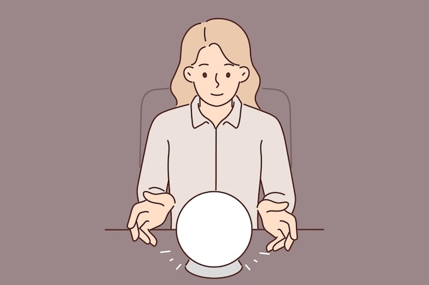 Mujer usa bola de cristal para predecir el futuro durante una sesión de espiritismo y brindar servicios psíquicos