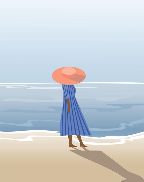 Mujer con un vestido azul en la playa con un sombrero grande