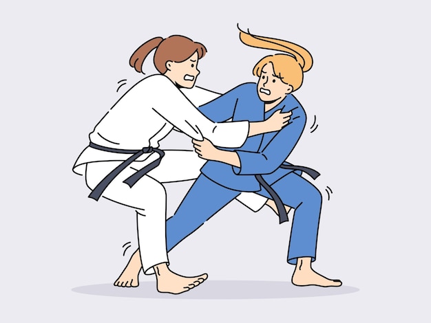 Mujeres en kimonos de karate luchando