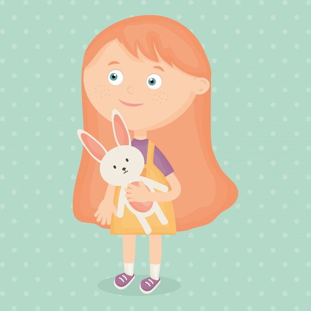 Niña jugando con conejo de peluche