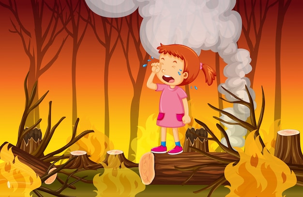 Una niña llorando en el bosque de incendios forestales