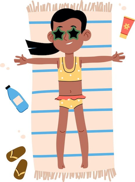 Niña relajándose en una toalla de playa