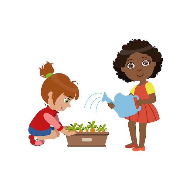 Niñas jardinería juntos