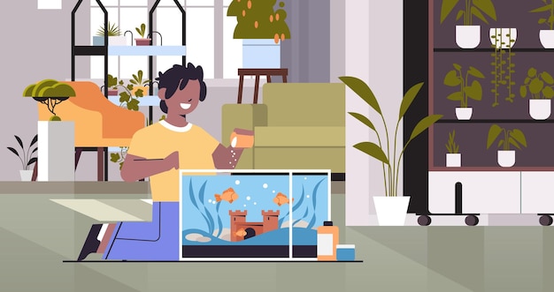 Niño afroamericano alimentando peces en el acuario amistad animal doméstico con concepto de mascota salón interior horizontal ilustración vectorial de longitud completa