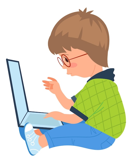 Niño con anteojos trabajando en una computadora portátil