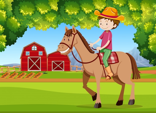 Un niño a caballo en las tierras de cultivo