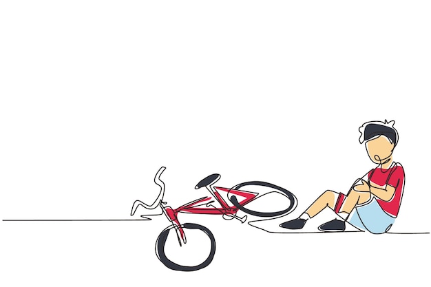 Un niño cae de una bicicleta en un accidente de bicicleta Los niños caen y dañan la bicicleta