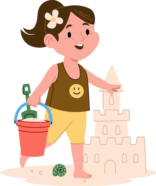 Un niño construye un castillo de arena en la playa
