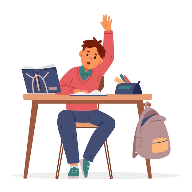 Niño de escuela sentado en el escritorio levantando la mano