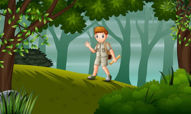 Un niño explorador caminando por la colina con mapas