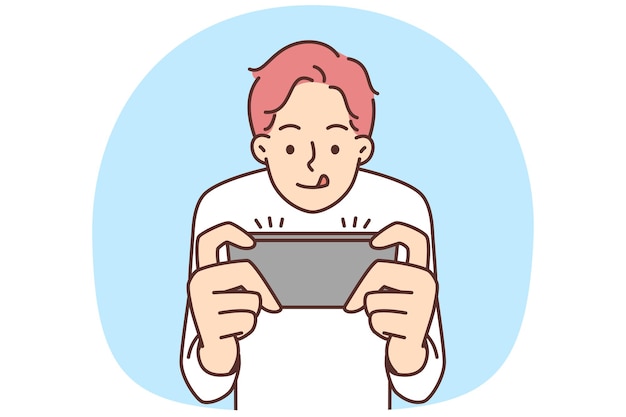 Niño juega videojuegos en el teléfono móvil