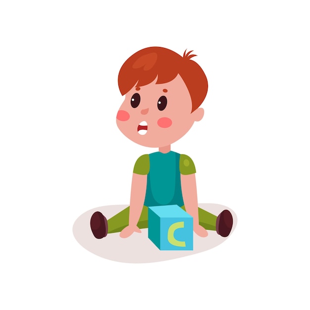 Un niño lindo sentado en el suelo jugando con un juguete de bloque, un niño aprendiendo a través de la diversión y jugando a un colorido vector de dibujos animados Ilustración en un fondo blanco