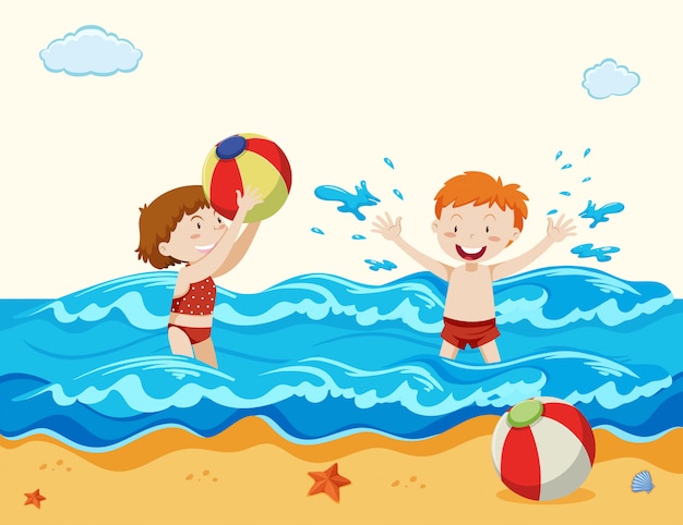 Niño y niña jugando en la playa